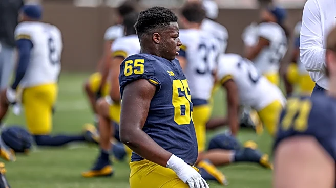 Michigan tackle Andrew Babalola returns to practice