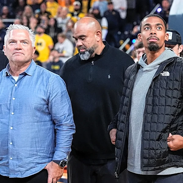 Utah sues Michigan football assistant Freddie Whittingham