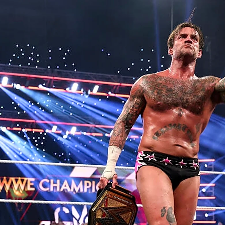 CM Punk Recreates Throwback Photo Following WWE Raw World Title Win