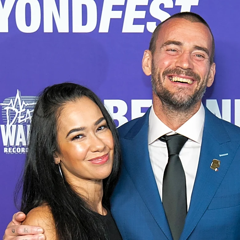 WWE's CM Punk & AJ Lee React To Late Dog Larry Being Recreated In Action Figure Form