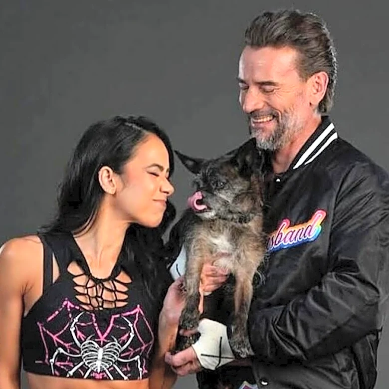 WWE Stars CM Punk & AJ Lee Reflect On Passing Of Their Dog Larry