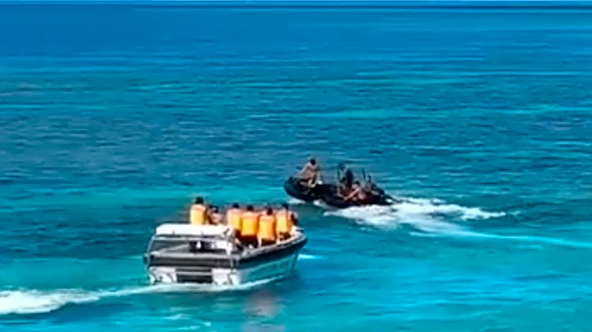 Filipinas acusa a guardacostas chinos de herir a marinero filipino en un bajío en disputa