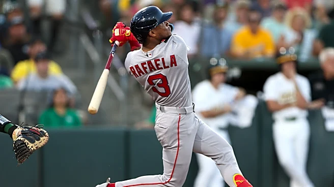 El grand slam de Ceddanne Rafaela impulsa a los Medias Rojas sobre los Atléticos 4-2
