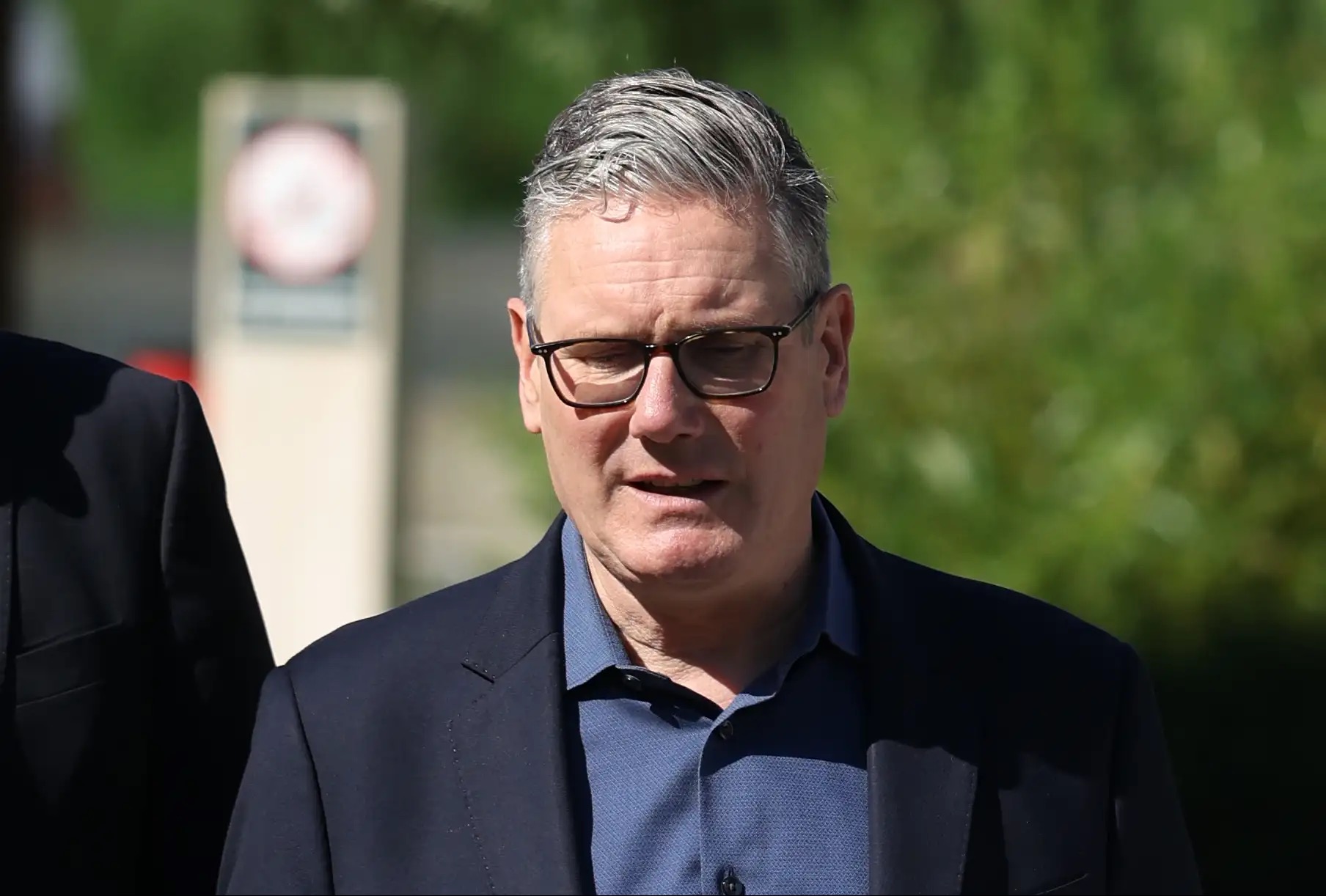 Keir Starmer resigns as UK prime minister but will stay on until successor is chosen