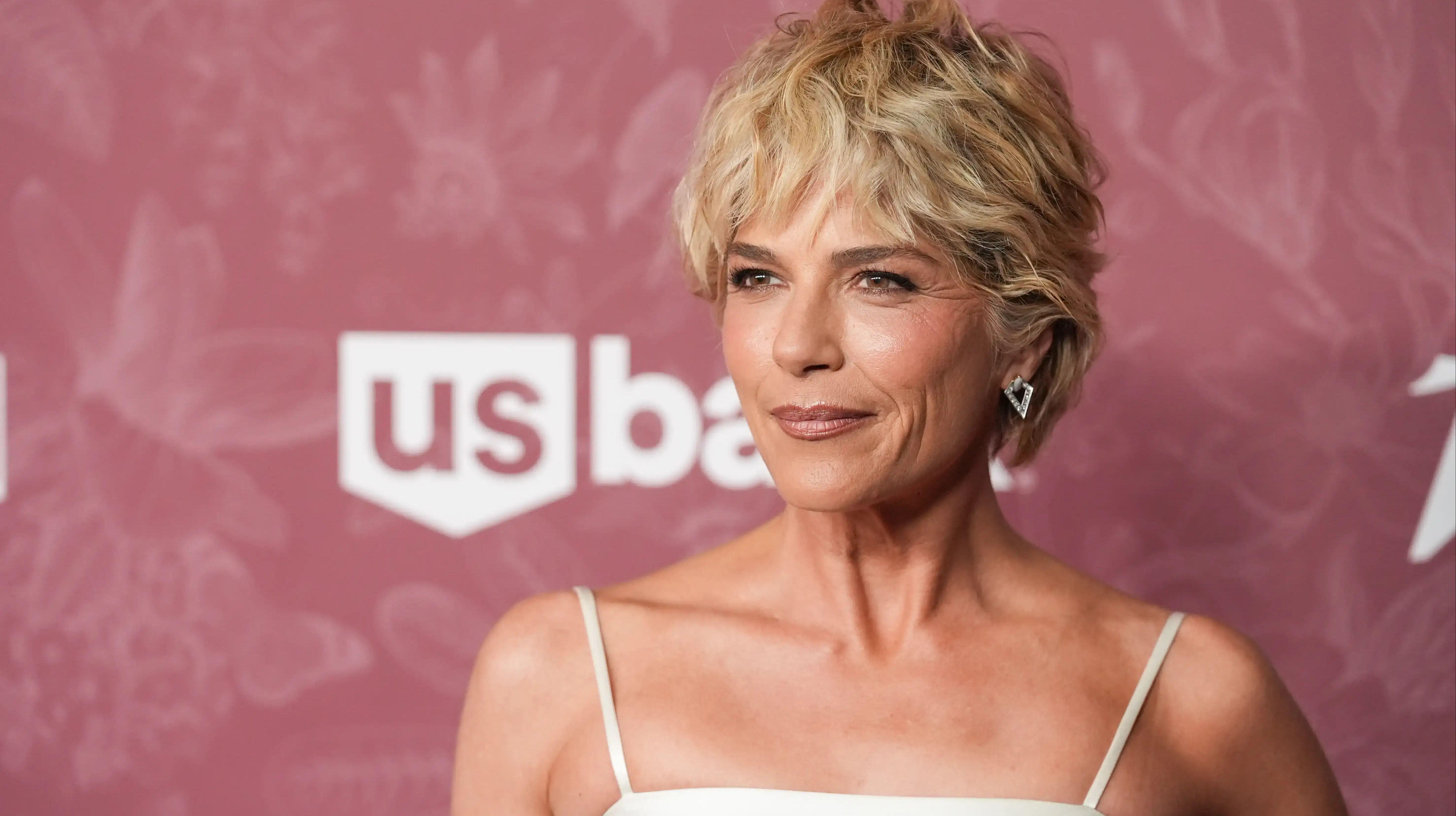 FBI issues actor Selma Blair a summons accusing her of assaults aboard a plane, AP source says