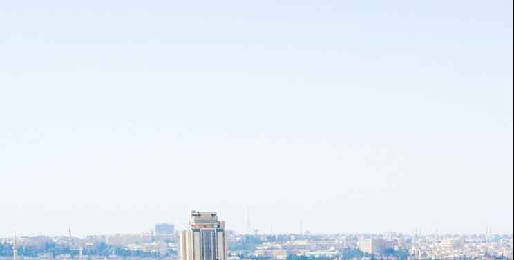 Civilians flee Aleppo as clashes between Syrian government and Kurdish forces escalate